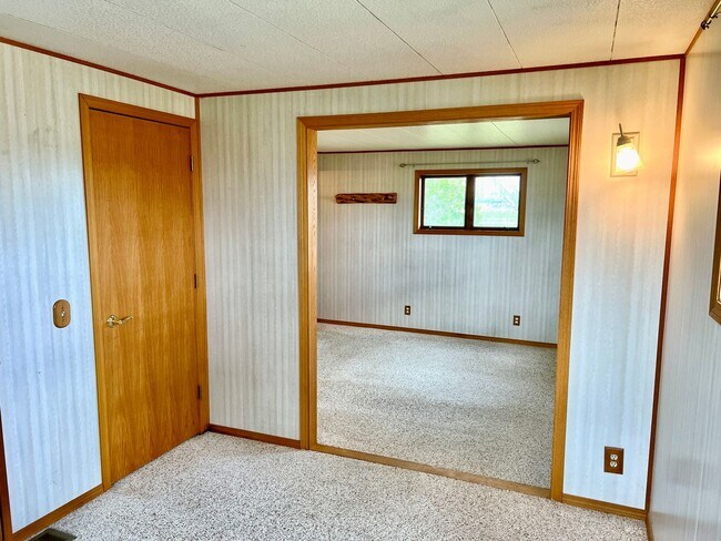 Building Photo - Pet Friendly 2 Bed 2 Bath Single Family Home With Garage, Private Deck and Big Yard!