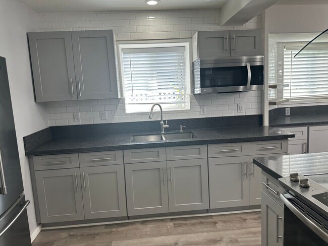 Building Photo - Free Perks, Spacious 4-Bedroom, 3-Bath Home!