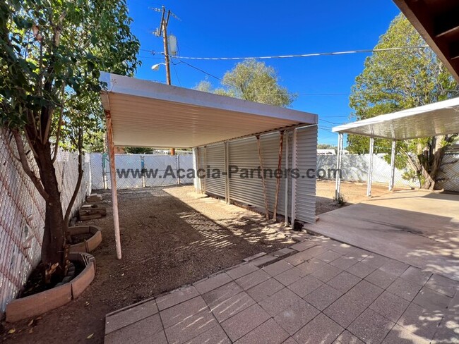 Building Photo - Centrally Located Home with Carport