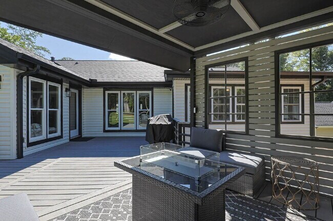 Building Photo - COMING SOON · Designer Renovation · Covered Deck Pavilion · 2-Car Garage · Lawn Care Included