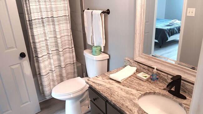 Building Photo - Furnished Two-Bedroom, Two-Bath Townhome i...