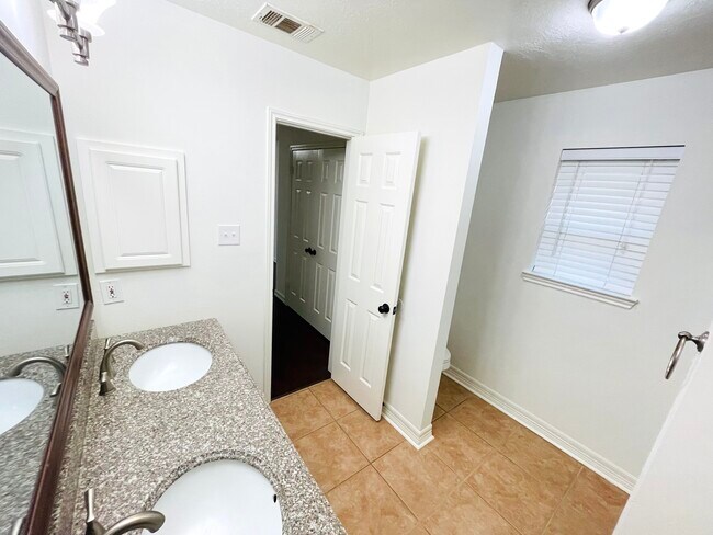 Primary bathroom - 14511 Enola Dr