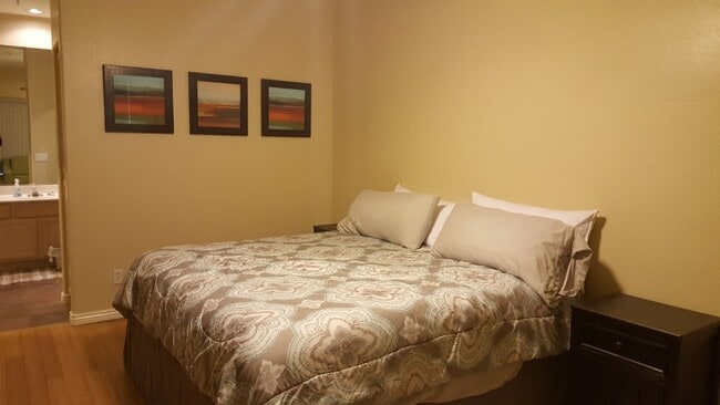 Building Photo - Luxurious 2-Bed/2-Bath Condo in Quiet Gated Community - Coming Soon!