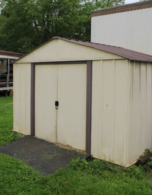 Building Photo - Charming Mobile Home with Utility Shed