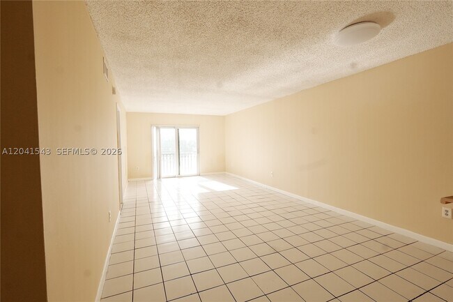 Building Photo - 9915 W Okeechobee Rd