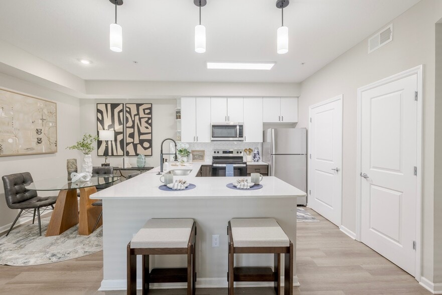 Newly Renovated Kitchen with Stainless Steel Appliances - The Chelsea Apartments