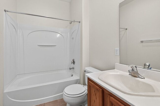 Building Photo - CORNER LOT 4-BEDROOM HOME + LOFT  WITH 3.5 BATHS AND 3-CAR GARAGE!