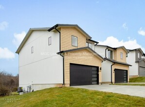 Building Photo - Highly sought after Ayden Place Duplexes with a 2-Car Garage in Kansas City: $500 off your Septem...
