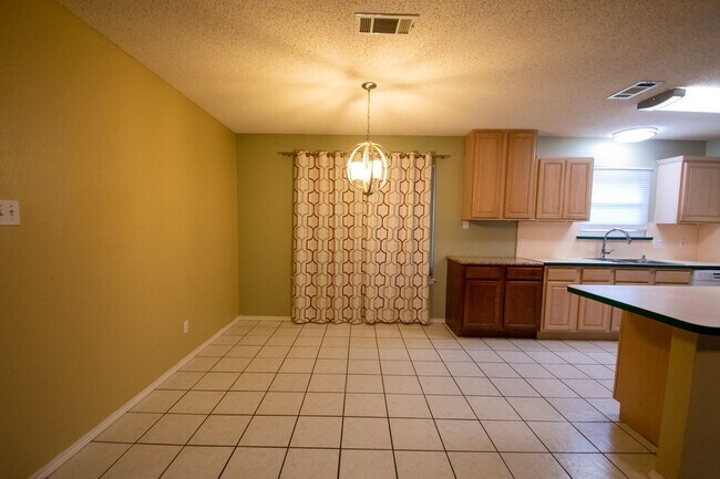 Building Photo - Cozy Fireplace, Bright Kitchen, and a Backyard Built for Gatherings