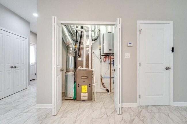 Building Photo - Brand-New 3-Bed, 2.5-Bath Condo: Modern Co...