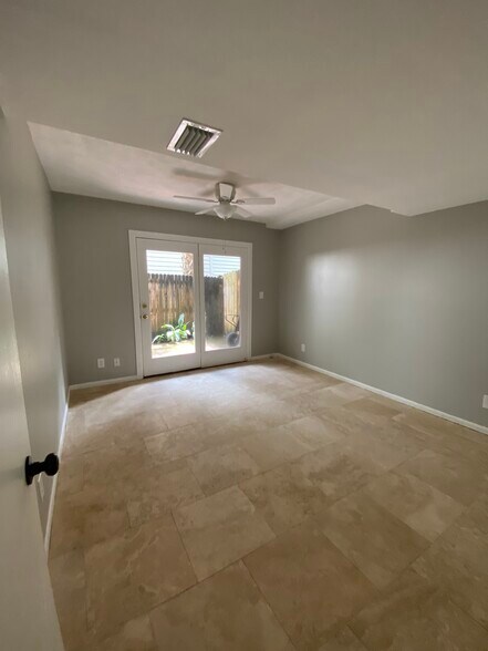 Second bedroom and courtyard - 3221 Herschel Street