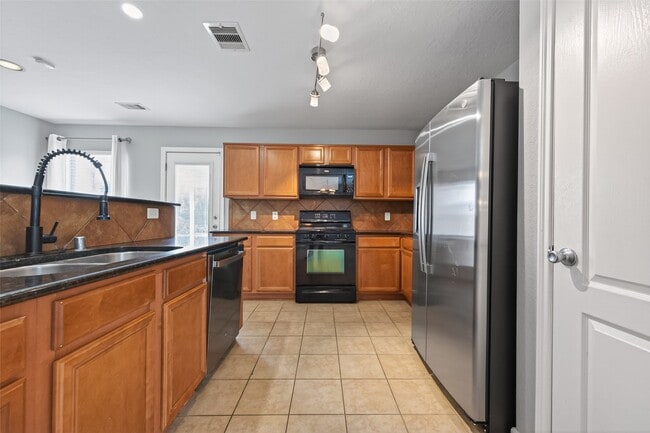 Building Photo - 16238 Ranchland Ln