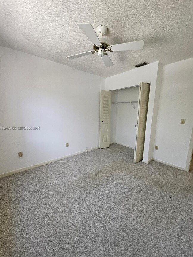 Building Photo - 9840 NW 9th Ct