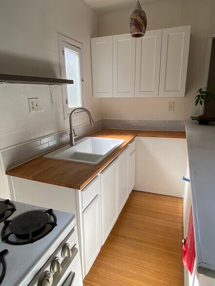 all new cabinets, sink, counter...etc - 12456 Short Ave