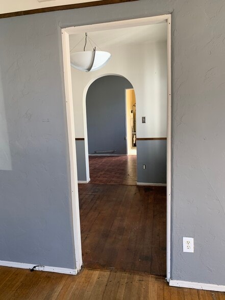 Living room, Dinning room, and utility room for washer and dryer. - 1069 Termino Ave