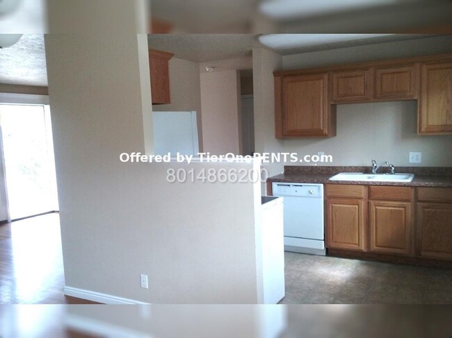 Building Photo - Charming 4-Bedroom Home with Hardwood Floo...