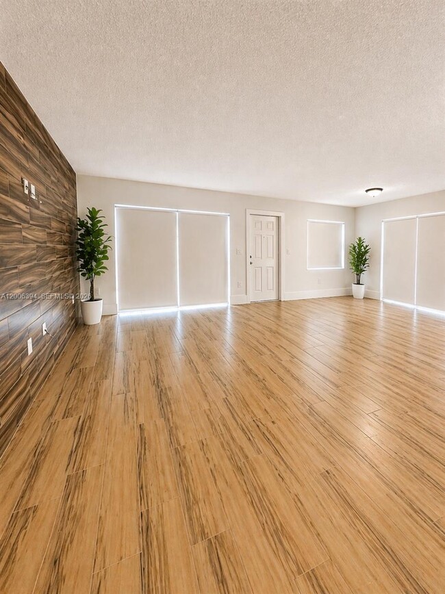 Building Photo - 8590 NW 3rd Ln