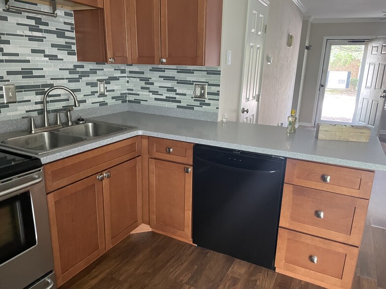 Kitchen facing front entrance - 109 Friar Ln