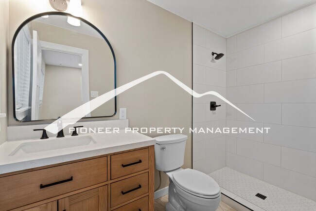 Building Photo - Beautifully Renovated Ranch Home with 2 Car Garage, AC, Garden Space & Prime Location