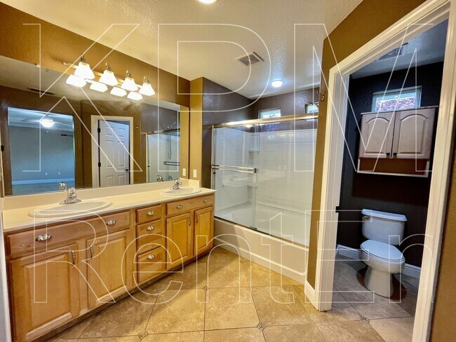 Building Photo - 5879 Riverbank Cir