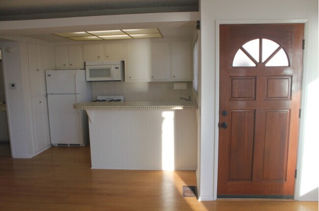 entry and kitchen - 3701 Ocean Dr
