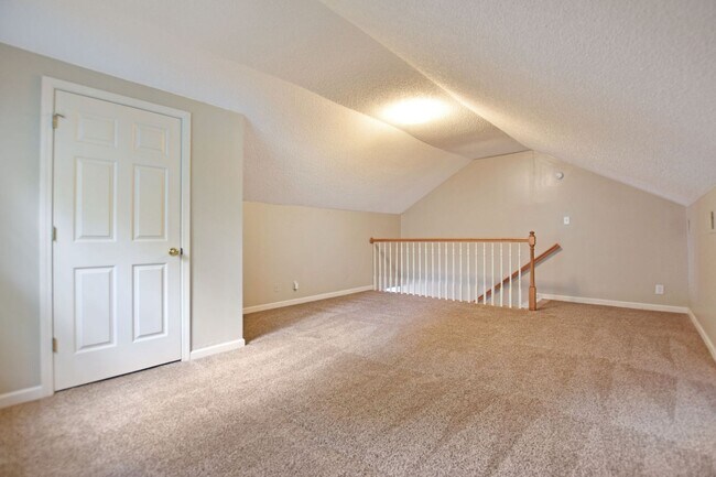 Building Photo - Pet Friendly Three Bedroom with Bonus!