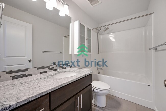 Building Photo - A Beautiful Corner Home Designed for Comfort, Light & Community!