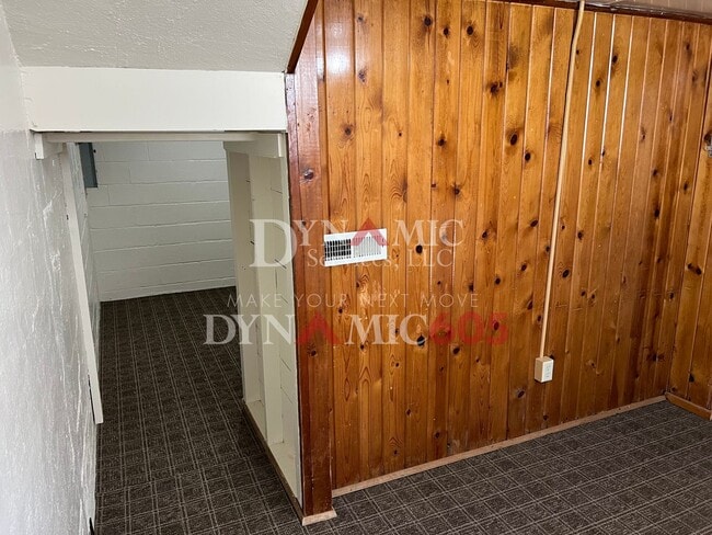 Building Photo - 4+ Bedroom, 2 Bath House with Garage and Fenced Backyard