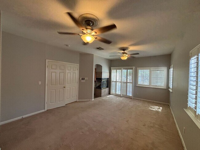 Building Photo - Gated Green Valley Ranch Townhome | 2 Bed | 2.5 Bath | 2-Car Garage