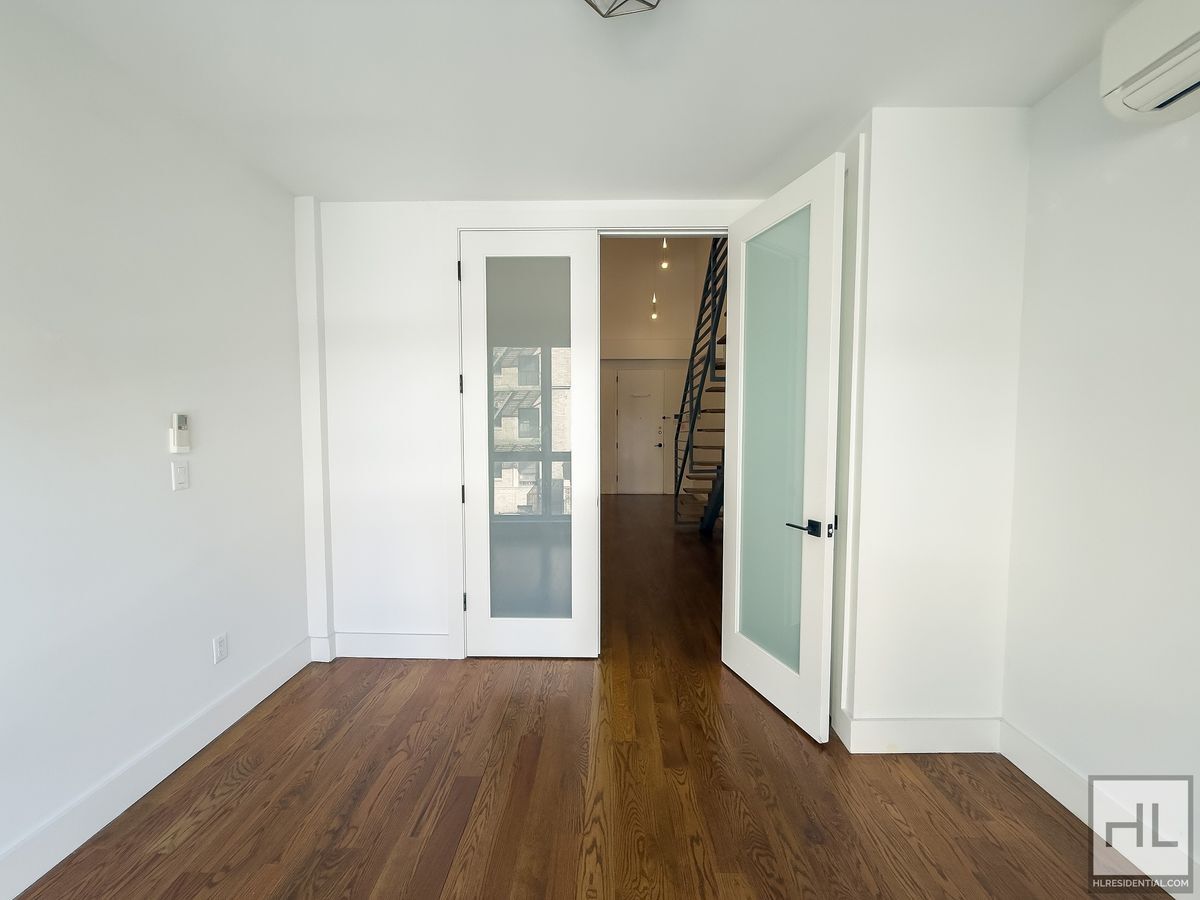 Building Photo - Stunning Two-Bedroom Duplex with Soaring 1...