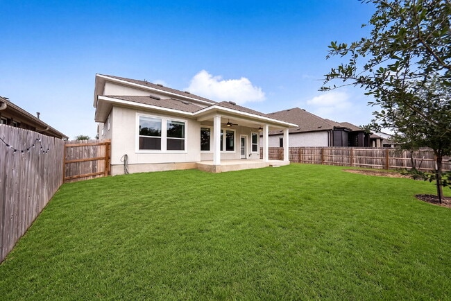 Building Photo - Greenbelt. 3 Car Garage. Built In Dog Room.