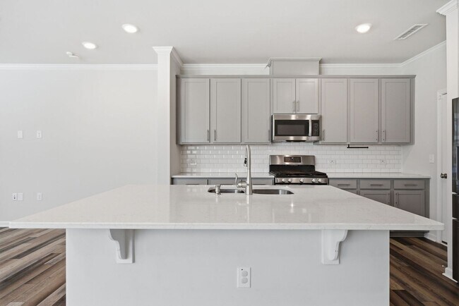 Building Photo - Upgraded 3BR Townhome in Wake Forest | Open Layout, Garage & Resort-Style Amenities