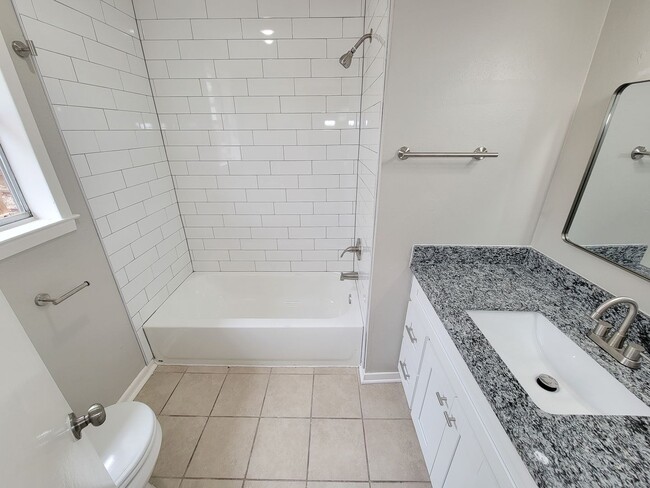 Building Photo - Welcome to your dream rental! This meticulously remodeled 3-bedroom, 2-bathroom home in the heart...
