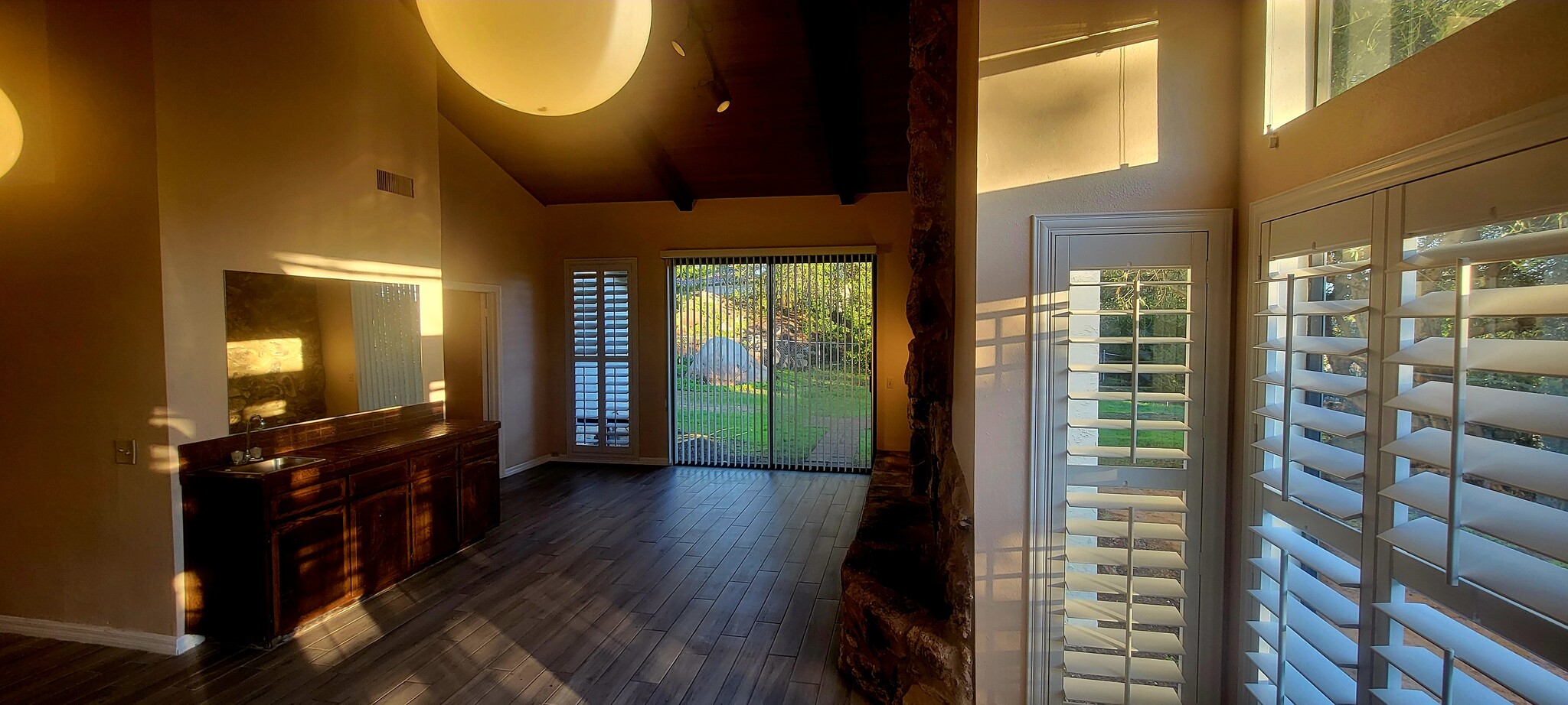 Family room with stone fireplace and wet bar - 16139 Ladera Piedra Way