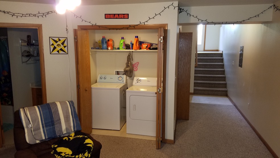 living area and laundry room - 803 S Van Buren St