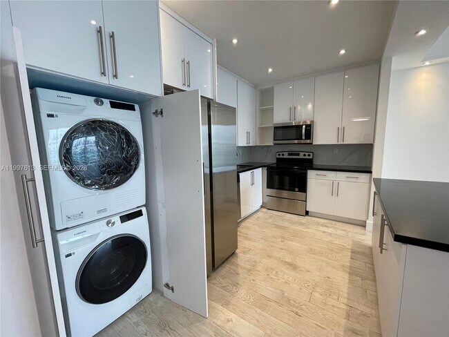 Building Photo - 19390 Collins Ave