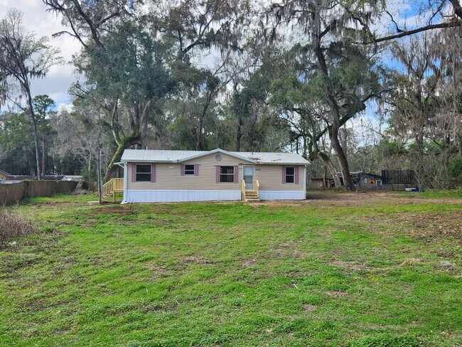 Building Photo - Looking for Acreage? This updated 3 bed, 2 bath home with an inside laundry room sits on 1.5 Acre...