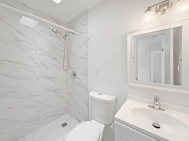 Building Photo - Spacious 4-Bedroom Retreat in the Heart of...