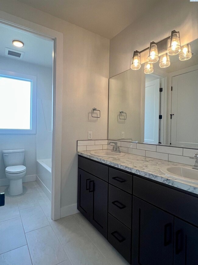 Building Photo - FOR RENT West Village Rambler with RV Bay