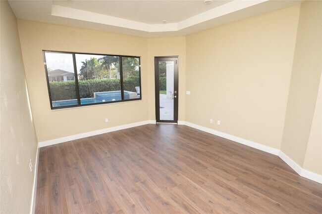Building Photo - 10660 S Lago Vista Cir