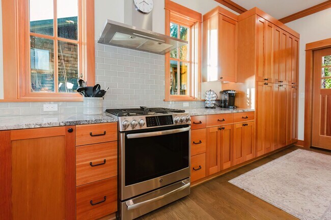 Building Photo - Impeccable Low Bank Bainbridge Waterfront Home with Private Dock