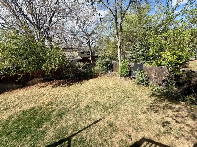Building Photo - Sprawling 6 BR 4 BA Applewood Paradise - Live in Luxury with this Entertainer's Dream!