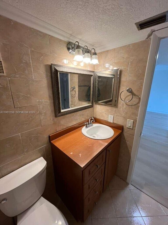 Building Photo - 8740 N Sherman Cir