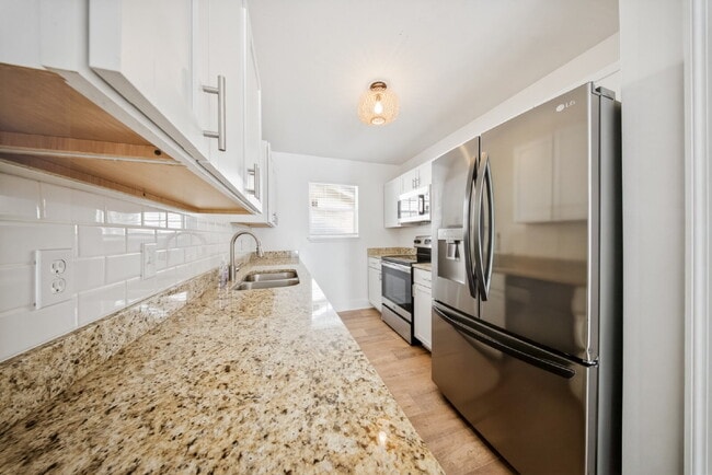 Building Photo - Beautifully Renovated 3BR/2BA Home with Fireplace, Fenced Yard & Garage in Timber Lake!