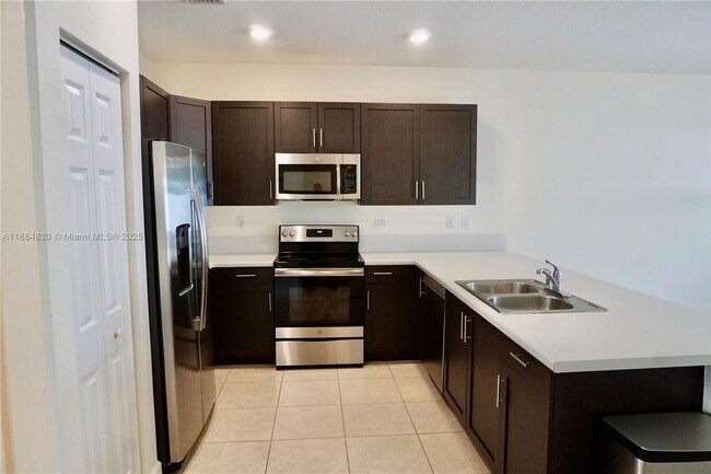 Building Photo - 10606 West 33rd Ct