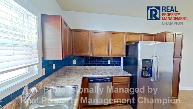 Building Photo - Beautiful Two-Story Townhome with Attached...