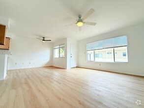 Building Photo - Stylish & Spacious 2-Bedroom Condo for Ren...