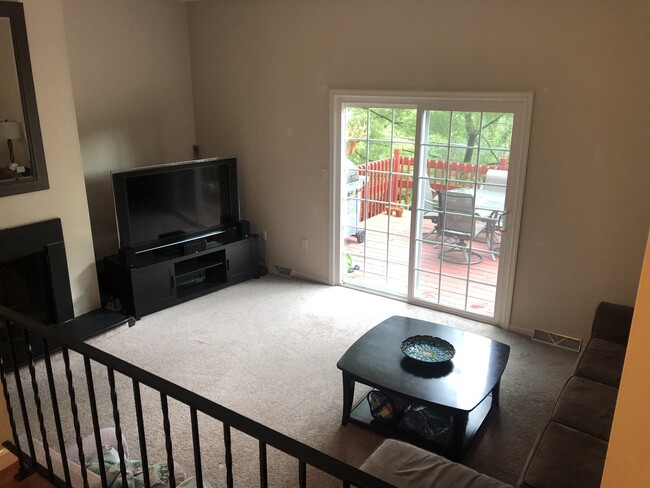 View of sunken family room from dining room - 233 London Towne Dr