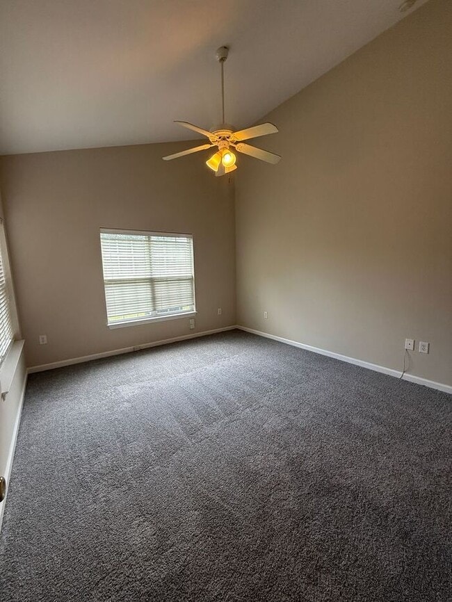 Building Photo - RENT SPECIAL! Freshly Painted! New Carpet!...