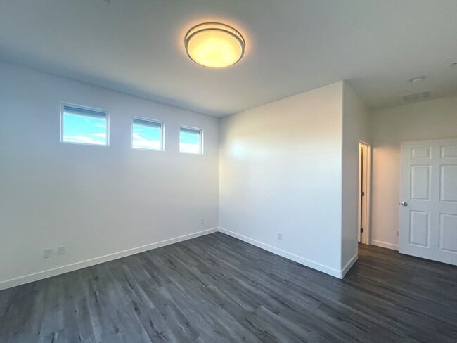 Building Photo - Single-story 1326 sq ft, townhome built in 2019 w/3 bed, 2 bath & spacious attached 2-car garage ...